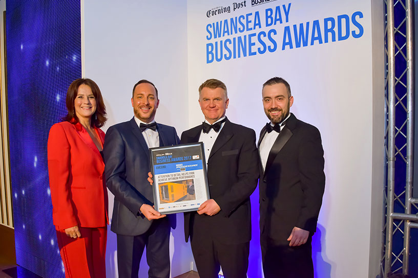 Owain being presented award at Swansea Bay Business awards