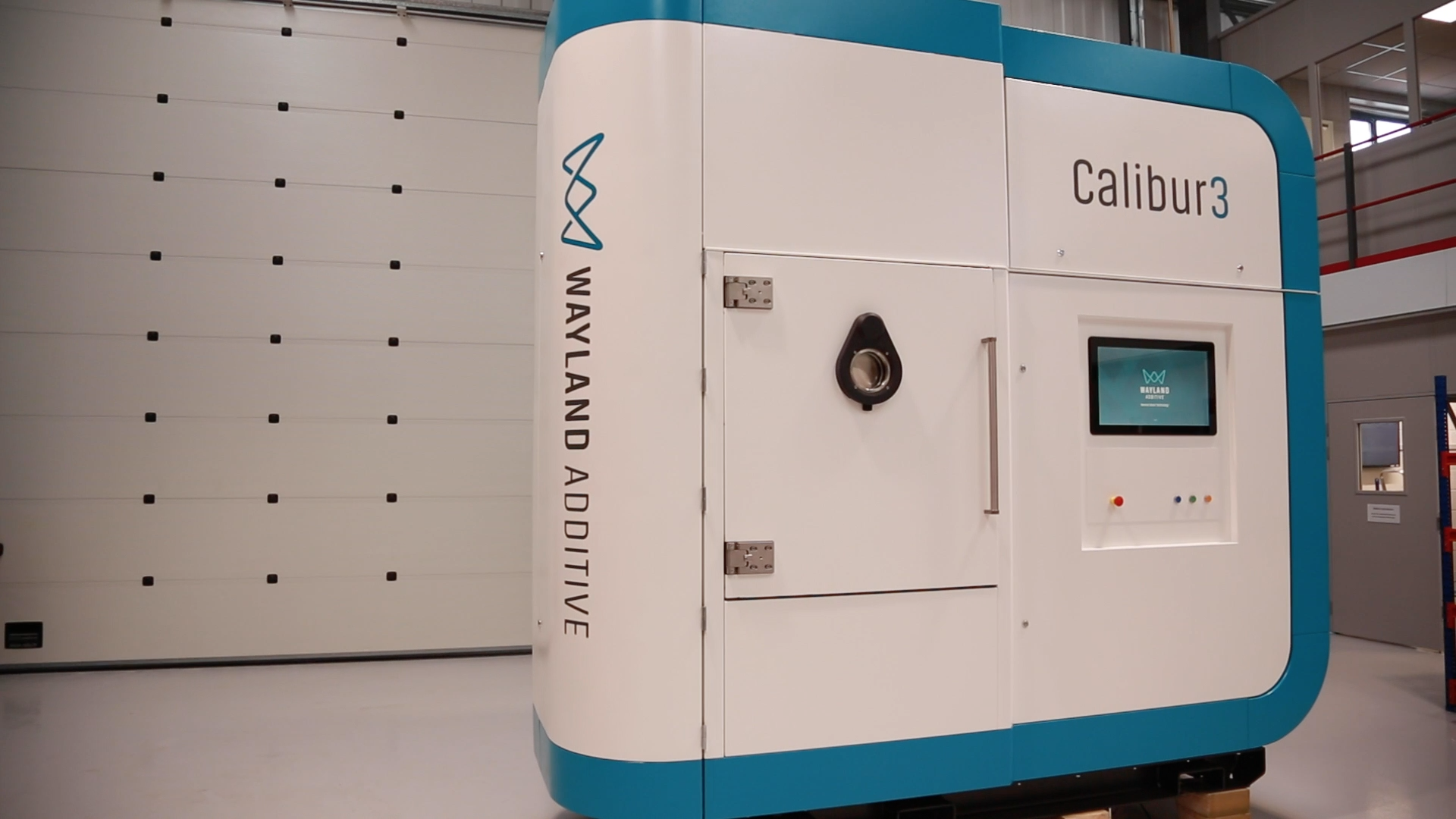 Calibur3 AM machine by Wayland Additive, with an enclosure by Amcanu.